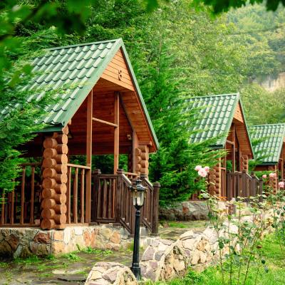 Wooden Arbors Among Trees Mountains